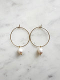 Elevate your style with these elegant Natural White Freshwater Rice Pearl Hoops. Featuring 8-9mm luminous natural white freshwater pearls delicately paired with 30mm hoops crafted from high-grade 304 Surgical Stainless Steel. Vacuum plated in Rhodium, these hoops offer a bright, durable finish and are perfect for sensitive skin. Timeless sophistication meets everyday wearability!