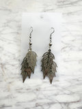 Elegant silver leaf earrings with surgical steel hooks – lightweight, hypoallergenic, and nature-inspired. 