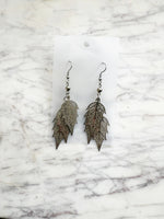 Elegant silver leaf earrings with surgical steel hooks – lightweight, hypoallergenic, and nature-inspired. 