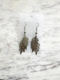 Elegant silver leaf earrings with surgical steel hooks – lightweight, hypoallergenic, and nature-inspired. 