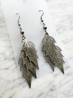 Elegant silver leaf earrings with surgical steel hooks – lightweight, hypoallergenic, and nature-inspired. 