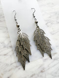 Elegant silver leaf earrings with surgical steel hooks – lightweight, hypoallergenic, and nature-inspired. 