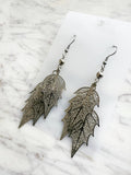 Elegant silver leaf earrings with surgical steel hooks – lightweight, hypoallergenic, and nature-inspired. 
