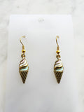 Kawaii Ice cream cone-shaped earrings on a marble background