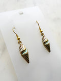Kawaii Ice cream cone-shaped earrings on a marble background