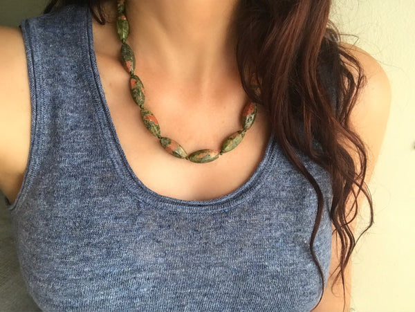 For the bohemian dreamer or modern mystic, this necklace is your ticket to a cosmic dance of style and substance. Embrace the allure of the old and the excitement of the new with our Vintage Unakite Crystal Necklace – because good vibes never go out of style!  50cm