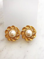 Make a statement with these vintage-inspired, gold rope dome pearl earrings! These earrings add a glamorous, yet elegant touch to any outfit. Make a bold, fashionable move today! The perfect accessory for any girl-boss!!  Gold Plated  Clip On   30mm x 30mm