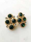 Introducing Harper, the perfect earrings to make your style stand out! These one-of-a-kind, emerald green clip-on earrings, with their glimmering crystals, will have you shining like a star (and feeling like one, too!) So, show a little sparkle, and strut your stuff!  Vintage Crystal  Gold Plated  Clip on Earrings  43mm x 26mm 