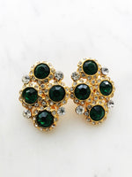 Introducing Harper, the perfect earrings to make your style stand out! These one-of-a-kind, emerald green clip-on earrings, with their glimmering crystals, will have you shining like a star (and feeling like one, too!) So, show a little sparkle, and strut your stuff!  Vintage Crystal  Gold Plated  Clip on Earrings  43mm x 26mm 