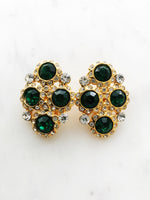 Introducing Harper, the perfect earrings to make your style stand out! These one-of-a-kind, emerald green clip-on earrings, with their glimmering crystals, will have you shining like a star (and feeling like one, too!) So, show a little sparkle, and strut your stuff!  Vintage Crystal  Gold Plated  Clip on Earrings  43mm x 26mm 