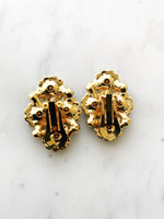 Introducing Harper, the perfect earrings to make your style stand out! These one-of-a-kind, clip-on earrings, with their glimmering crystals, will have you shining like a star (and feeling like one, too!) So, show a little sparkle and strut your stuff!  Vintage Crystal  Gold Plated  Clip on Earrings  43mm x 26mm