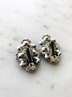 Introducing Harper, the perfect earrings to make your style stand out! These one-of-a-kind, clip-on earrings, with their glimmering crystals, will have you shining like a star (and feeling like one, too!) So, show a little sparkle and strut your stuff!  Vintage Crystal  Silver Plated  Clip on Earrings  43mm x 26mm