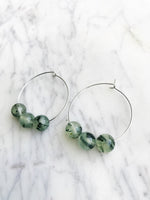 Prehnite Hoops  30mm Hoop  6mm Prehnite Crystals  Silver Plated    Prehnite is considered a stone of unconditional love and the crystal to heal the healer. It enhances precognition and inner knowing. It is a gorgeous stone that is linked with Shamanism and Prophecy. Enables you to always to be prepared. Prehnite calms the environment and brings peace and protection. I