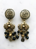 Add an antique touch to your wardrobe with these vintage bronze boho earrings! Featuring an intricate, eye-catching design, they'll add a bold and unique style to any outfit. Get ready to dazzle!  80mm x 26mm