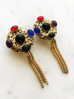 Wow your friends with these unique Vintage Retro Glass Bead Earrings! They'll be sure to provide an eye-catching sparkle to any look - no piercing required! Never boring and always sure to turn heads with these voguish, retro-chic earrings. Hop on the vintage bandwagon today!  Gold Plated   Clip On Earrings  70mm x 30mm 