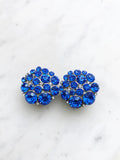 Be a trendsetter with these vintage blue crystal clip-on earrings. They feature a timeless design and shimmering crystals - a glamorous look with no need for piercings!  Vintage Crystal  Silver Plated  Clip on Earrings  35mm x 35mm