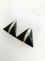 Balancing a cool combination of classic and modern styles, these vintage art deco crystal earrings make a bold fashion statement. Let these busy little triangles bring a bit of sparkle and shine to your day (and night)! Truly the perfect trendy accessory for the fashionista who likes to take the road less traveled.  Vintage Crystal  Silver Plated  25mm x 25mm