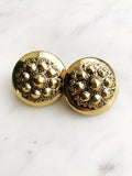 Stand out with these glamorous yet vintage-inspired dome earrings! These stunning earrings feature an antique bronze finish, making them perfect for adding a touch of elegance to your look. Add a hint of glamour and sophistication with these unique earrings – you won't regret it! Gold Plated  Clip On   30mm x 30mm