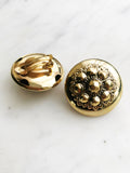 Stand out with these glamorous yet vintage-inspired dome earrings! These stunning earrings feature an antique bronze finish, making them perfect for adding a touch of elegance to your look. Add a hint of glamour and sophistication with these unique earrings – you won't regret it! Gold Plated  Clip On   30mm x 30mm