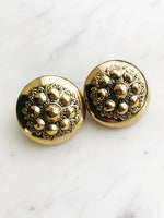 Stand out with these glamorous yet vintage-inspired dome earrings! These stunning earrings feature an antique bronze finish, making them perfect for adding a touch of elegance to your look. Add a hint of glamour and sophistication with these unique earrings – you won't regret it! Gold Plated  Clip On   30mm x 30mm