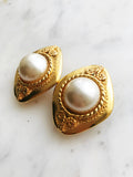 Add some vintage dazzle to your everyday look with these domed pearl clip-on earrings. Magnificently designed, they feature a sleek, classic finish that will make heads turn! These pearls have style that won't ever go out of fashion!  Gold Plated  Clip On   40mm x 30mm