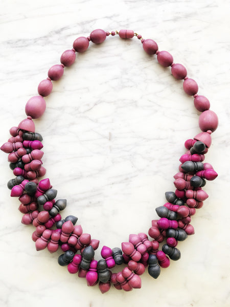 This Vintage Wooden Bead Necklace is a statement piece you won't want to miss! Show off your sense of style with this classic piece that adds personality to any outfit. It's unique fun and flirty design will have heads turning and your friends asking where you got it!  Wooden Beads  52cm length