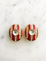 Ignite your style with these Red Enamel Crystal Clip-on Earrings, perfect for unleashing your inner rebel. Let your outfit roar with confidence and stand out from the crowd!  Gold Plated   Clip On Earrings  31mm x 25mm